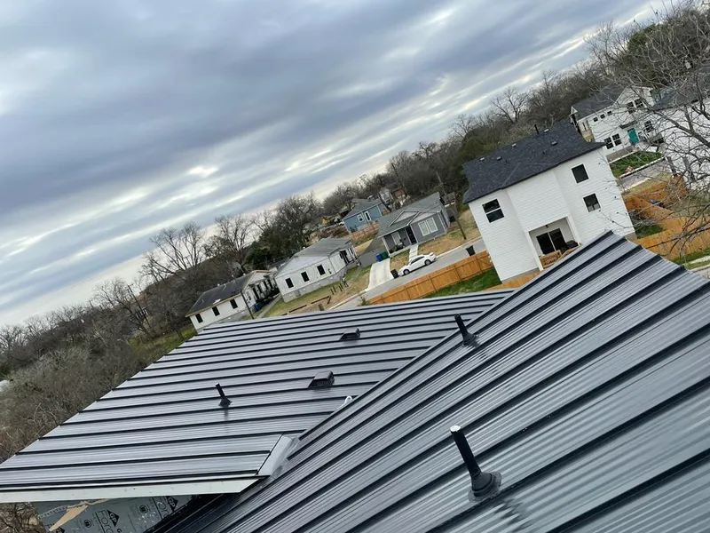 Standing seam metal roof panels with vents for Skylight Repair in Forestbrook